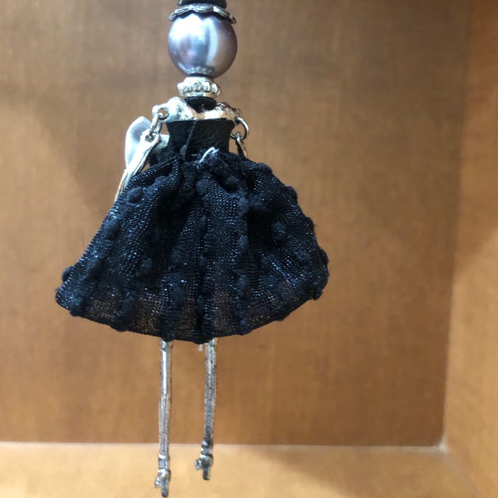 Statement Doll Necklace with Bow - Picture 3 of 6